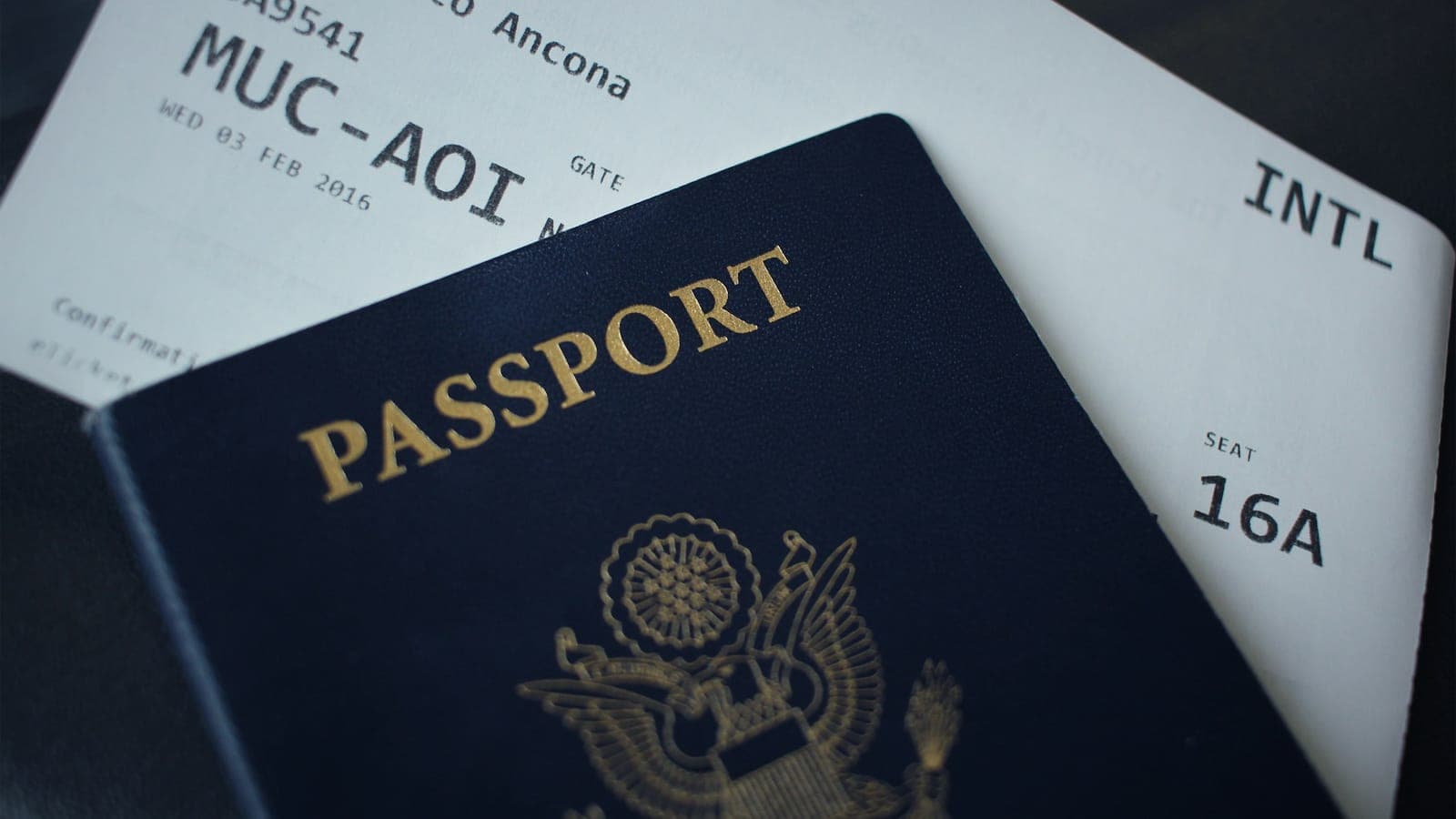 Passport resting on filing paperwork