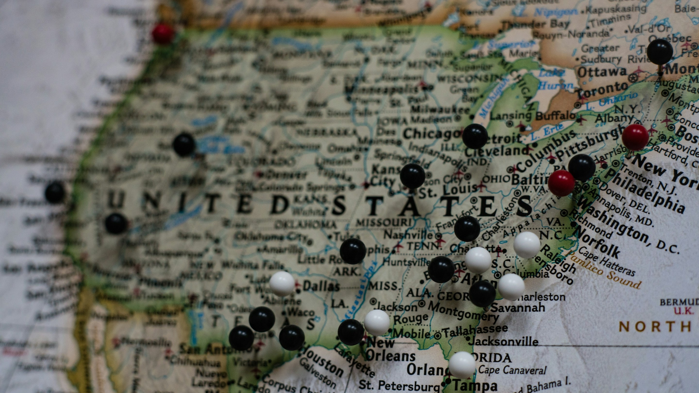 A map of the United States with pins in several states